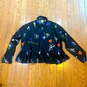 Adorable printed peplum blouse.